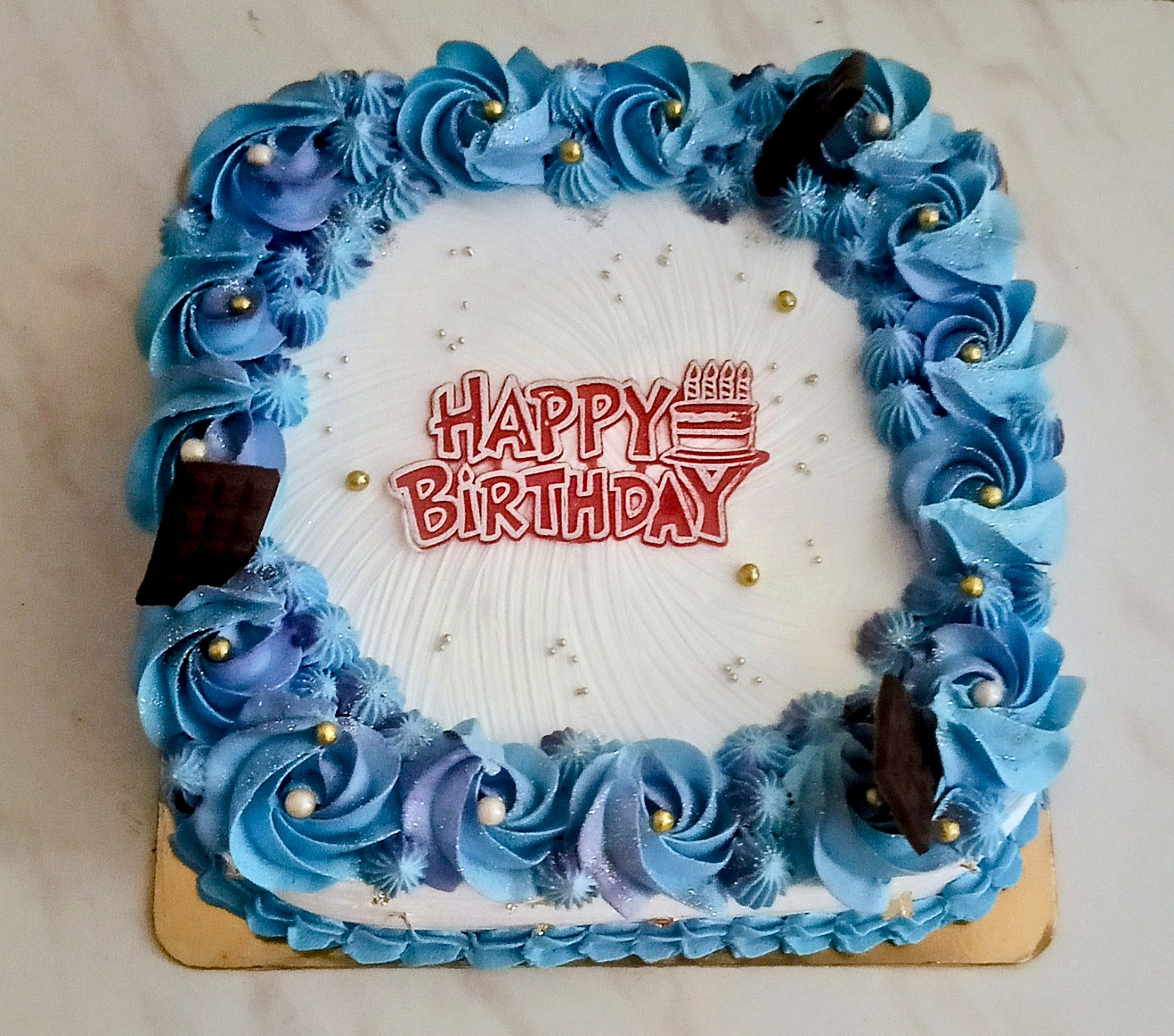 Birthday cake decorated with elegant frosting